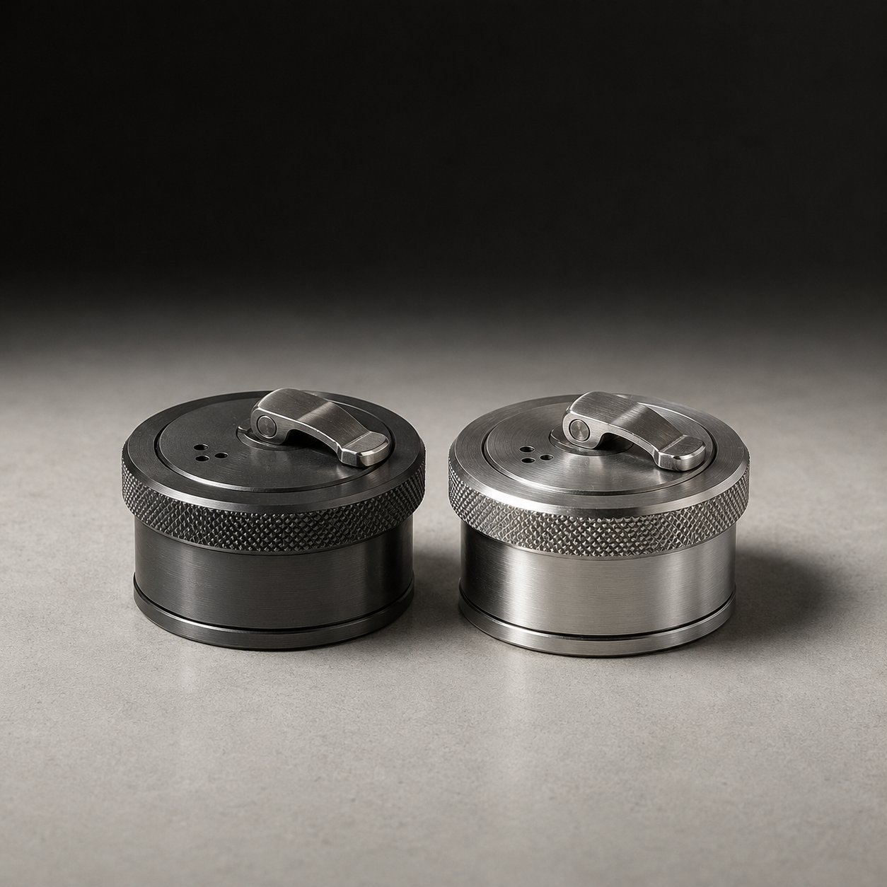 Salt and pepper shakers shaped like machined fuel filler caps